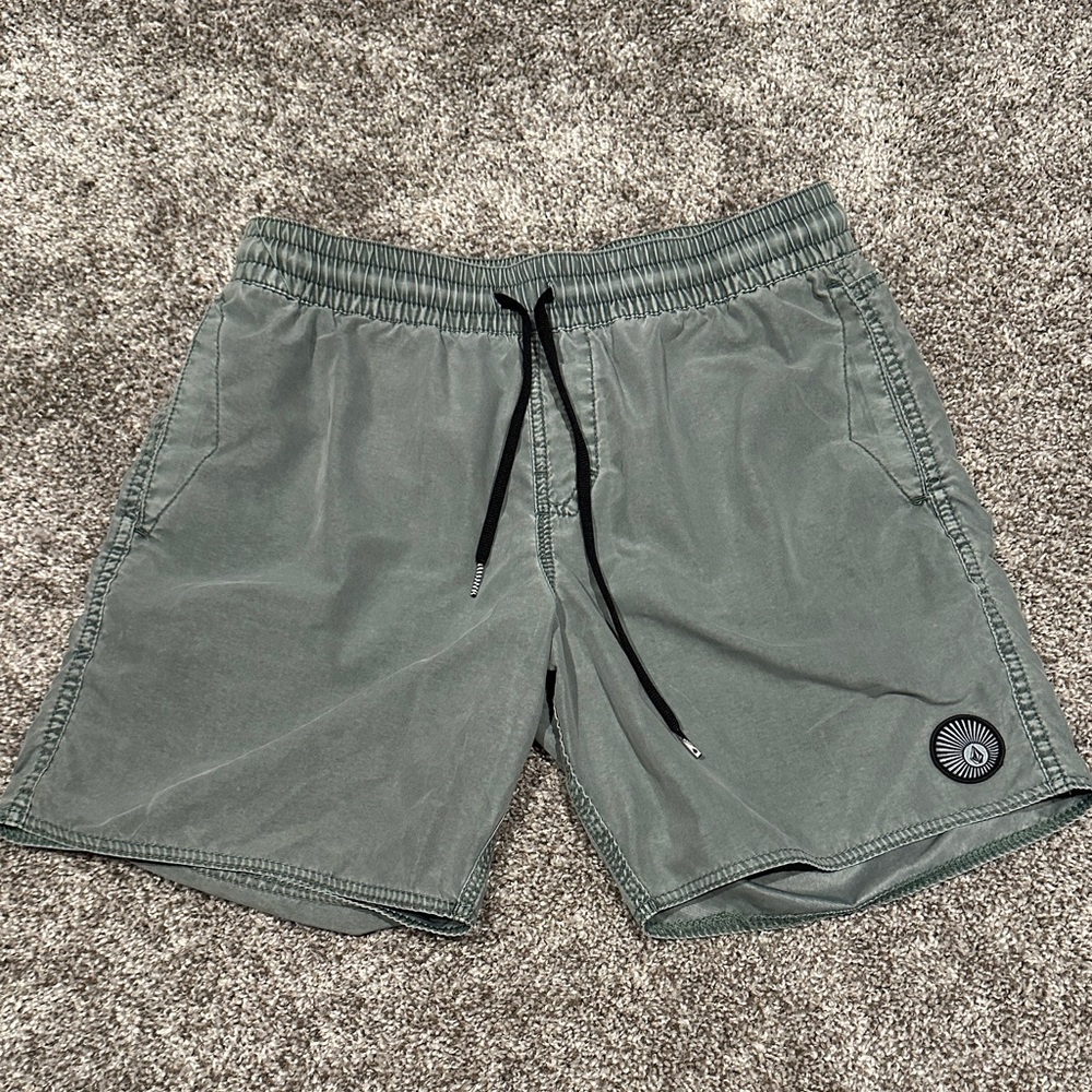 Green Volcom swim shorts